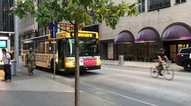 A National Guard Member Walks Along Nicollet Mall in Minneapolis Before Curfew