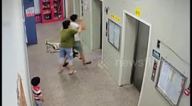 Chinese residents get trapped in lift after drunk man violently kicks it