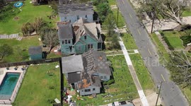 Aerial Static View of Hurricane Laura Damage in a neighborhood with pool