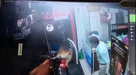 CCTV captures terrifying moment two bulls slam into men on motorbike