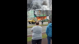 Impressive fire in motorcycle warehouse and assorted products