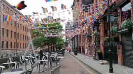 Man Put Up Rainbow Flags for Pride