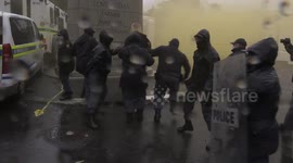 Police use tear gas and rubber bullets to disperse protesters outside South African parliament