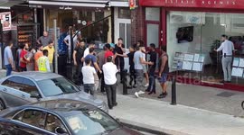 NW London. End of people fighting in street. Mum steps in for her son.