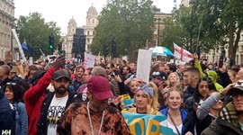 UK Anti-Government activists chant,