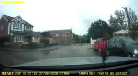 Lightning strikes neighbour's house caught on dash cam