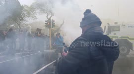 Journalist hit by teargas continues filming at #EndFemicide protest