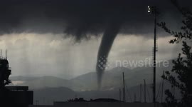 Large waterspout swirls near Genoa Aiport in Italy
