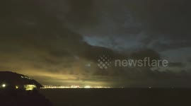 timelapse distant severe thunderstorm at dawn near Genoa Italy