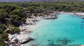 Exotic emerald water beach in Greece from a drone
