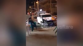 Car smashes into outdoor dining area, injuring four in northern China