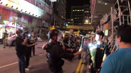 Police quash Hong Kong protesters trying to remember anniversary of violent clashes