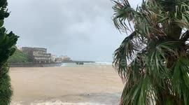 Typhoon Maysak down by the river flooding into ocean