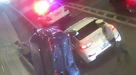 Vehicle is flipped on its side as car attempts to overtake in China