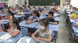 Wuhan students fully return back to schools after months of coronavirus lockdown