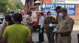 Indian police distributed surgical masks amid COVID-19 pandemic in northern India