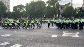 Extinction Rebellion protest takes place in London's Parliament Square under police presence
