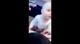 Baby loves her hair brushed!