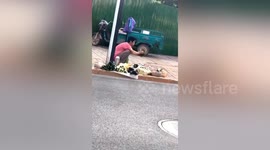 Vendor spotted using their mouth to spray water on vegetables in China