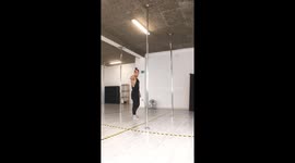 Man Performs Impressive Pole Tricks