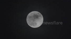 Full  Corn Moon rising in Quezon City, Philippines