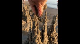 Creative Way of Turning a Tide by a Drip Sandcastle