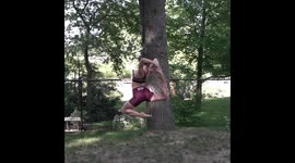 Canada-based dancer spins incredibly fast while hanging from tree by her hair