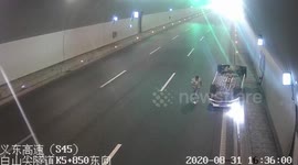 Car flips over and slides along road after crashing in eastern China