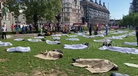 UK: Extinction Rebellion Protest Day 2 – Activists Stage ‘Die-In’ Outside Parliament Square In London