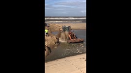Tractor gets stuck on Blackpool beach as tide comes in