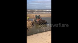 Tractor submerged on Blackpool beach after becoming trapped by high tide