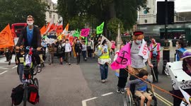 Extinction rebellion protesters rally against HS2 at Westminster abbey