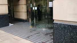 Aftermath of wild, hand-gluing Extinction Rebellion protests at London's Department for Transport
