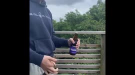 Teen twirls bottle opener around finger and slams open a bottle of beer in one fluid movement