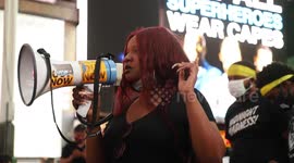 Black Lives Matter demonstrators rally in Times Square and outside Trump hotel