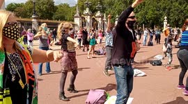 Extinction Rebellion 'DISCObedience' flash mob dance protest outside Buckingham Palace