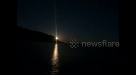 Stunning timelaspse shows moon rise over Lake Baikal in Russia