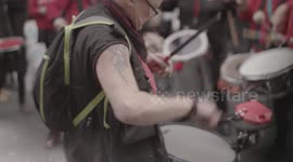 Women playing percussion during protest (From London's Women March/Protest)