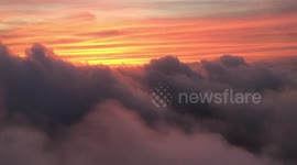 Sunset from the window of an airplane