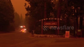 Wildfire at the gates of historic Camp Edison on Shaver Lake California