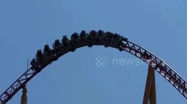 Chinese tourists hang upside down on roller coaster due to equipment failure