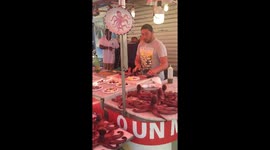 Italian market | Guy screaming and selling octopus