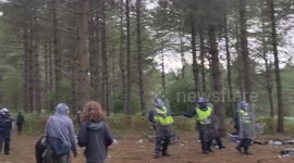 Watch the shocking moment dozens of cops arrived to shut down a huge illegal forest rave