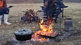 Cooking on fire in African mountains