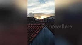 Rare 'snake cloud' hovers close to volcano in Indonesia