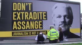 Julian Assange mobile billboard stopped by police in London's Parliament Square