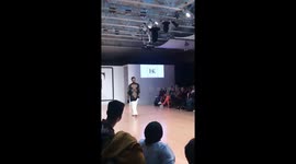 Beautiful black male model on catwalk