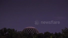 A strange looking giant UFO with lights appears in Thailand, during a thunderstorm, a small space craft with flashing lights flies from it, time to RUN and hide!!