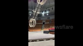 Backflip from the wheel of death performed by a circus acrobat