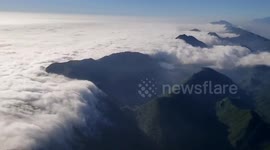 Amazing views of mist rolling from the hills towards the Mexican city of Monterrey